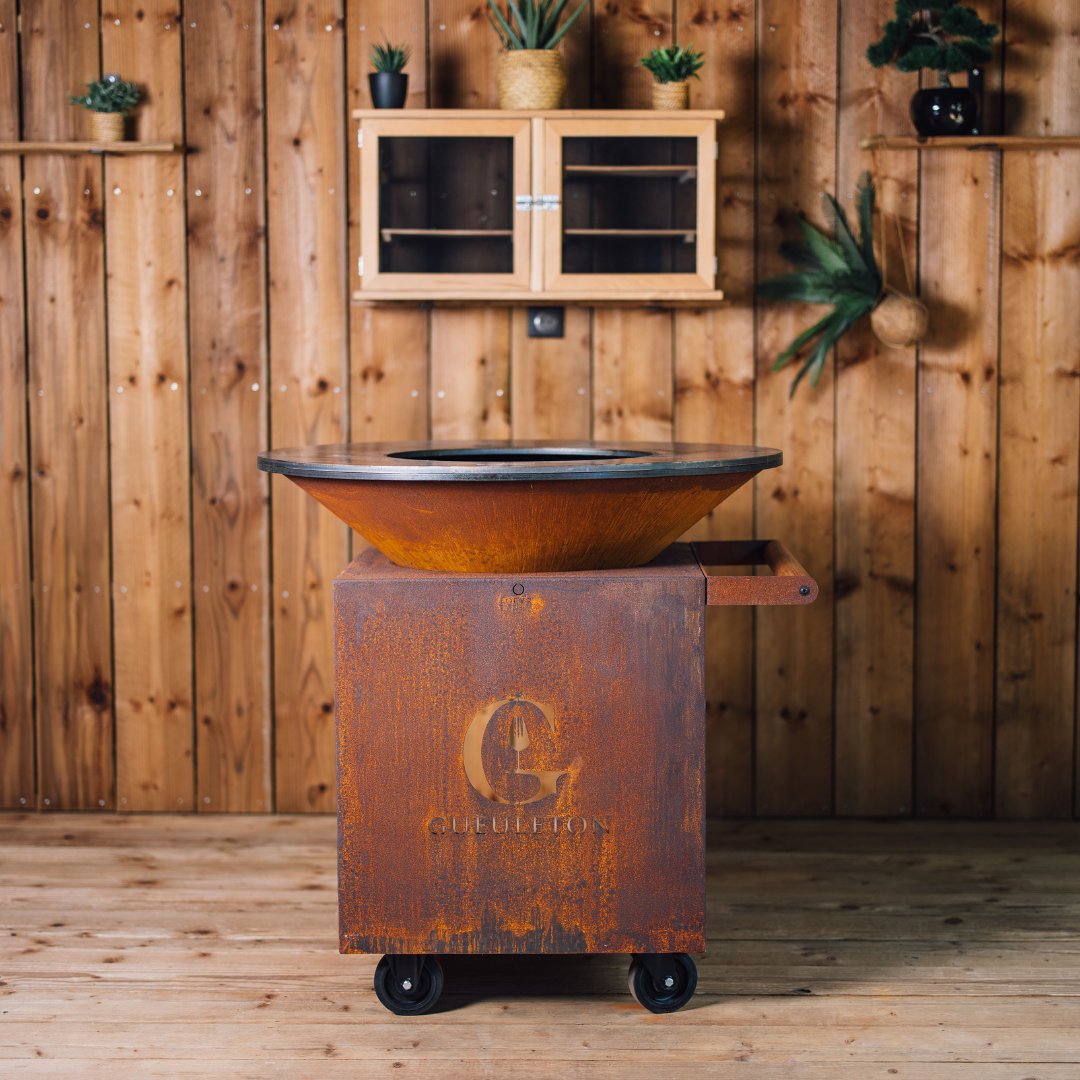 Brasero Classic Storage Corten 100 PRO sur roulettes rangement bois intégré grille cendres extérieur Gueuleton